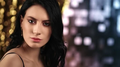 Closeup face of seductive brunette lady with bright makeup and natural beauty Stock Footage 150688039