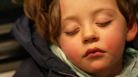 Closeup face of sleeping child. Small boy asleep macro close up. Kid nappin.. Stock Footage 252084191