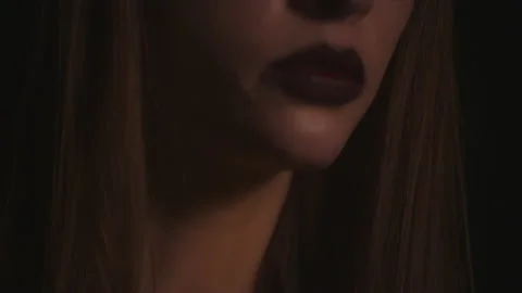 Closeup Face of Wiccan Lady Practices Speaking to Demonic Spirits, tilt up Stock Footage 156837035