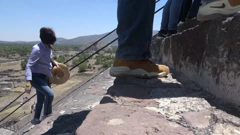 Closeup Of Feet Climbing Steps Of Pyramid Of The Sun At Teotihuacan, Mexico City Stock Footage 154573519