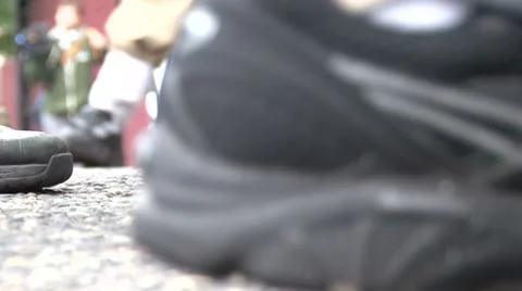 Closeup of feet marching by the camera Stock Footage 8831991