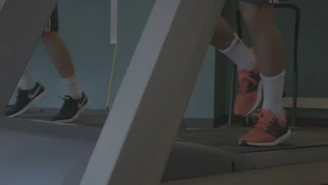 Closeup of Feet Running on a Treadmill Stock-Footage 154004632