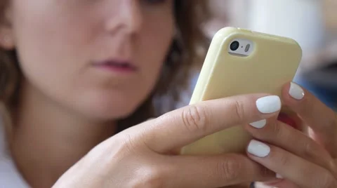 Closeup of Female Hand Using a Smart Phone Stock Footage 57933142
