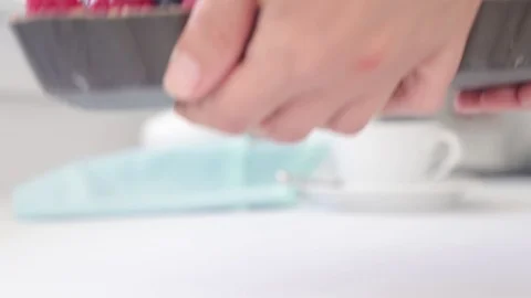 Closeup female hands put on the table homemade berry pie. breakfast concept. App Stock Footage 112102110