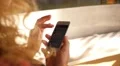 Closeup of Female Hands Using a Smart Phone Outdoors. HD Footage