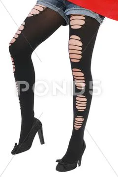 Closeup of female legs, studio shot over white background Stock Photos