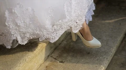 Closeup of female legs walking down the stairs Stock Footage 63592866