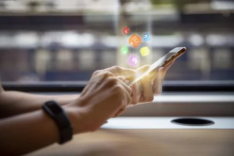 Closeup of female using smartphone with icon digital box social network in .. Stock Photos