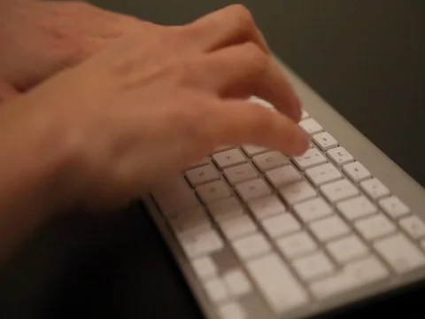 Closeup female's hands typing computer keyboard Stock Footage 73833038
