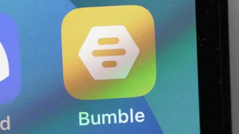 Closeup Finger Opening Bumble Dating App On a Mobile Device Stock Footage 169893688