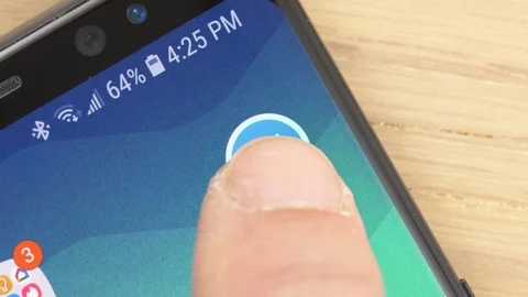 Closeup on a Finger Opening Telegram app Icon on a Smartphone 스톡 동영상 107230923