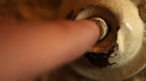 Closeup of a finger ringing doorbell of an old vintage 1920's doorbell Stock Footage 47533071