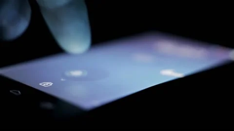 Closeup of finger touching a smartphone with a touch screen to scroll of list Stock-Footage 43692527
