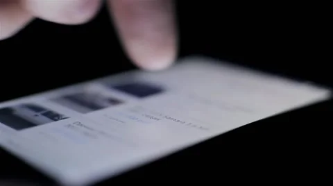 Closeup of finger touching a smartphone with a touch screen to scroll of list Stock-Footage 43692568