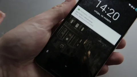 Closeup of finger touching a smartphone with a touch screen to unlocking phone Stock Footage 70140864