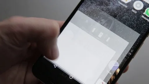 Closeup of finger touching a smartphone with a touch screen to call number Stock Footage 70140987