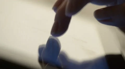 Closeup finger touching tablet computer touchscreen Video stock 49119835