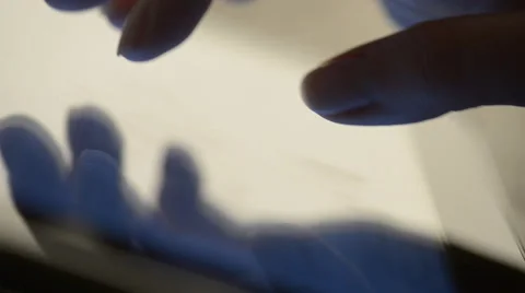 Closeup finger touching tablet computer touchscreen Stock Footage 49119844