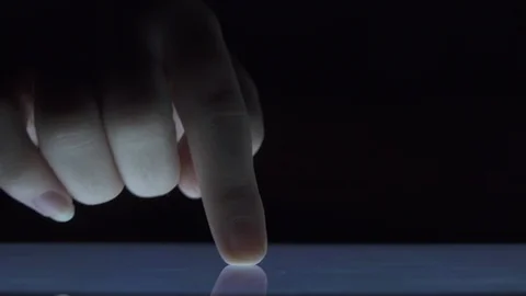 Closeup finger touching tablet computer touchscreen Stock Footage 101336756