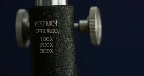 Closeup of fingers configuring microscope lens Stock Footage 105537817