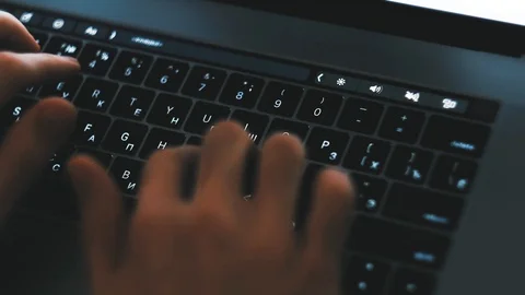 Closeup of fingers typing on laptop computer keyboard Stock Footage 124134206