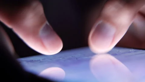 Closeup fingers typing texting a message on smartphone. Stock Footage 90189396