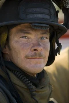 Closeup of fire fighter at work Foto stock