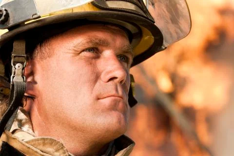 Closeup of fire fighter at work 库存照片