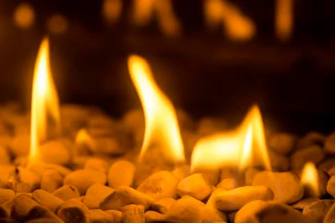 Closeup of fire flames in a chimney Stock Photos