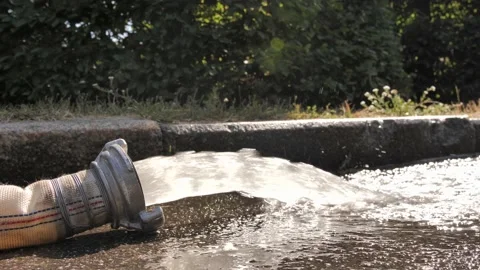 Closeup fire hose with flow of running water Stock Footage 150504017