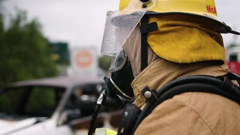 Closeup of firefighter training on car fire. Stock Footage 87842491