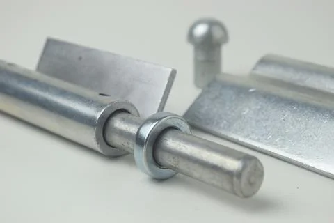 Closeup A fireproof iron hinge made in Indonesia with a white background Stock Photos