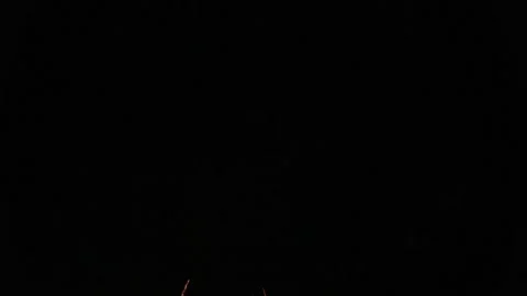 Closeup of fireworks exploding in the night sky. Explosion of pyrotechnics. 4K Stock Footage 280536146