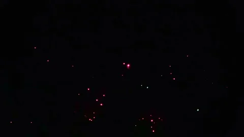 Closeup of fireworks exploding in the night sky. Explosion of pyrotechnics. 4K Vidéo 280637806