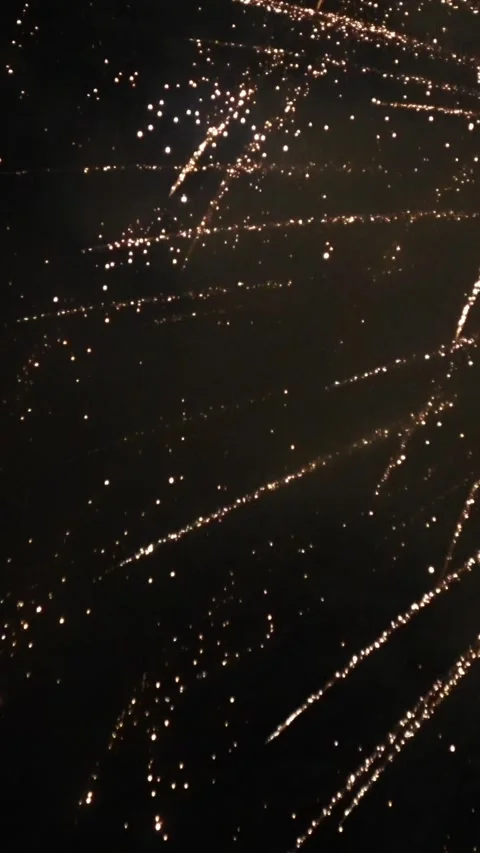 Closeup of fireworks exploding in the night sky. Explosion of pyrotechnics. 4K Stock-Footage 340302556