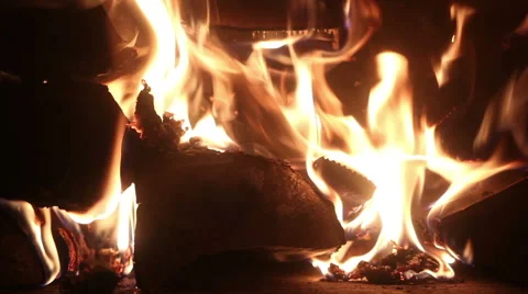 Closeup of flame and embers burning in a wood-fired oven Stock Footage 68846876