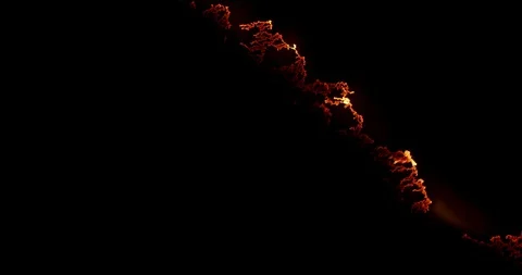 Closeup of the flame of a burning paper moving from the right to the left side Stock Footage 98528799