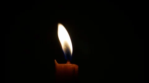 Closeup flame in dark Stock Footage 99837342