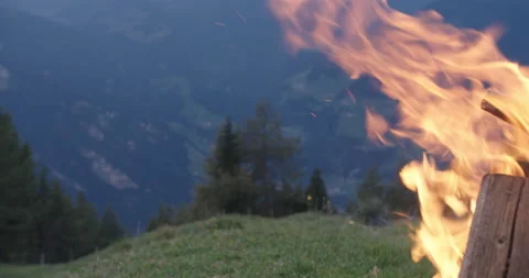 Closeup of flames in wind from a burning campfire Video stock 230236553