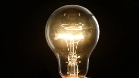 Closeup flashing light bulb Stock Footage 78255746