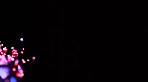 Closeup of flicker lights move on black Stock Footage
