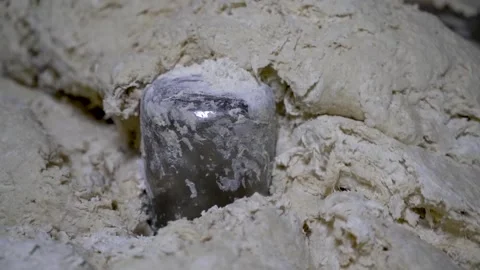 Closeup of flour getting mixed in large industrial mixer. Stock-Footage 134475619