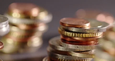 Closeup focus Pulling on Euro Coins, European Wealth and Savings Market. Stock Footage 147937406