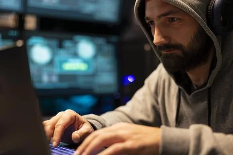 Closeup of focused programmer writing code on laptop Stockfoto's