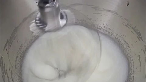 Closeup of a food processor whipping cream. Stock Footage 171035588