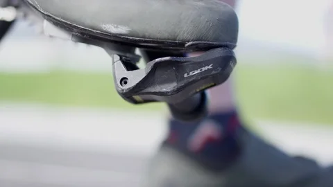 Closeup of a foot locking into bicycle pedals Stock Footage 113483350