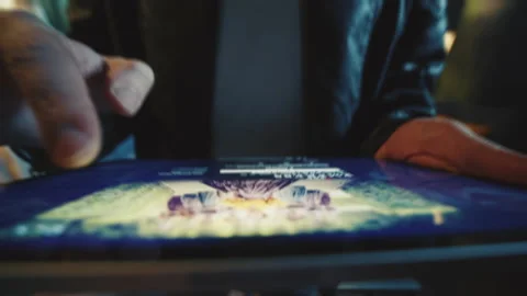 Closeup footage of digital tablet in man's hands. Unrecognizable young man in Stock Footage 238743215