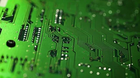Closeup footage on integrated circuit under the light Video stock 77774244