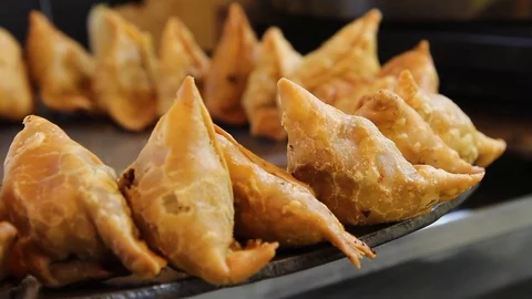 Closeup footage of popular Indian fast food snack, Samosa Stock Footage 108251853