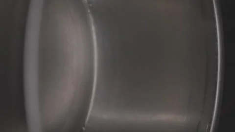 Closeup footage of putting ghee with a table spoon into a big stainless bowl, Stock Footage 276794318